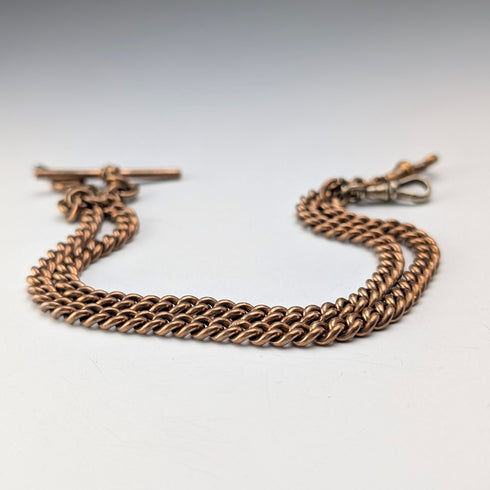 Antique British rolled gold double Albert chain with brass key fob